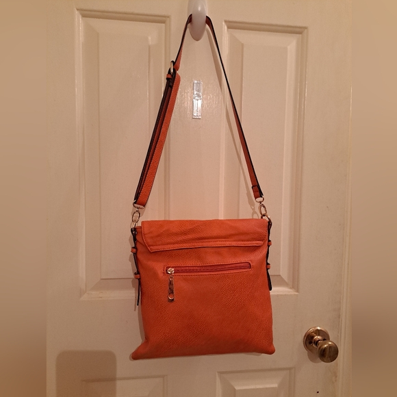 Orange crossbody purse. Took tags off but never wore it. - Picture 2 of 8